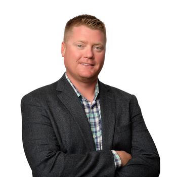 Portrait of Drew Glaser, REALTOR®.